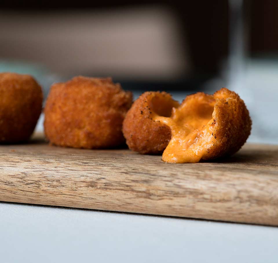 Croquetas cremosas artesanales, la esencia de la comida asturiana en Madrid Tetuán.